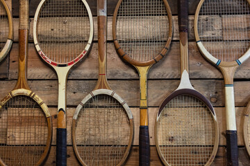 Old Fashioned Broken Wooden Tennis Rackets or Racquets - obrazy, fototapety, plakaty