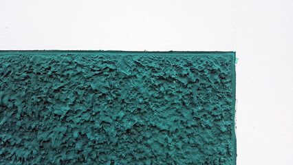 green rough texture on white wall