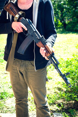 An armed man with a machine gun. Ukraine