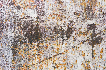 Old scratched and rusty painted metal surface, background texture. Texture of metal rusty wall