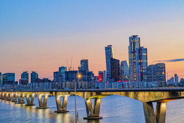 Naklejka premium Cityscape night view of Yeouido, Seoul at sunset time