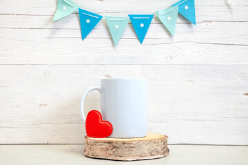 Mockup of a white ceramic mug with blue flags
