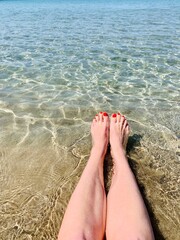 feet on the beach