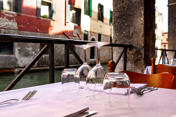 View of the canal from a table in a restaurant in Venice