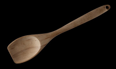 Empty wooden kitchen spoon isolated on black with clipping path, top view