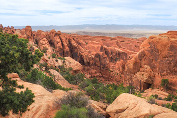 View of Fin Canyon on the Devil's Garden trail in the Arches National Park, Utah, USA. Sandstone rock geological formations in Utah desert. Hiking in the American southwest on a nice day of spring.