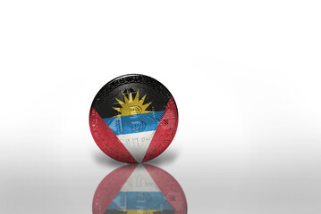 bitcoin with the national flag of antigua and barbuda on the white background. bitcoin mining concept.