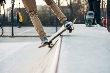 Young skateboarder skateboarding at city