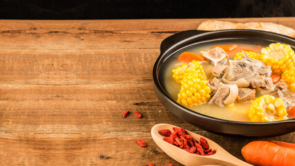 Stewed mutton soup with corn and carrot
