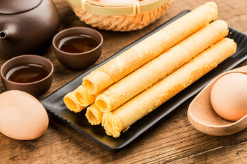 Egg roll biscuit on plate