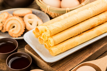 Egg roll biscuit on plate