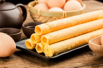 Egg roll biscuit on plate