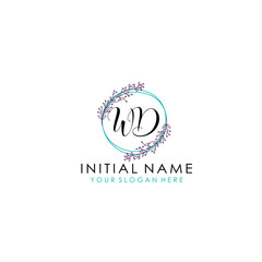 Fototapeta premium Initial letter WD handwriting with floral frame template