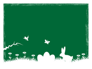 Easter background with rabbit and eggs on grass.