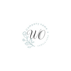 Initial letter WO handwriting with floral frame template