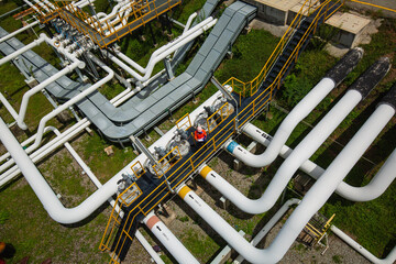 Top view male worker inspection at valve of visual check record pipeline oil and gas.