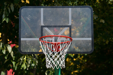 New basketball hoop basket on a sports playground that is used for training.