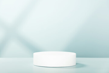 Abstract empty white podium with geometric shadows on blue background. Mock up stand for product presentation.  Minimal concept
