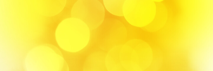 Bright yellow sparkling glitter bokeh background, banner texture. Abstract defocused lights header....