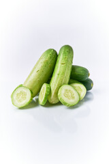 Close-up of fresh young cucumber isolated on a white background