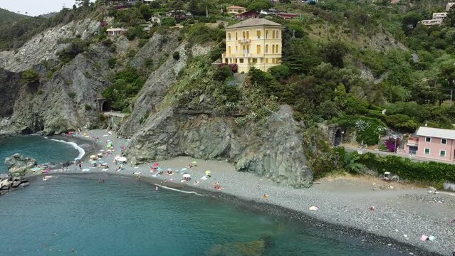 Europe, Italy , Liguria , Drone aerial view of Levanto Bonassola Framura cycle  pedestrian path - old galleries tunnels  in the rock by the sea - tourist attraction in the Cinque Terre