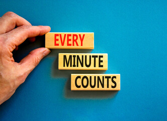 Every minute counts symbol. Concept words Every minute counts on wooden blocks on a beautiful blue table blue background. Businessman hand. Business, motivational and every minute counts concept.