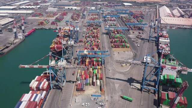 Shipping Containers on platform at Commercial port, aerial
Drone view from , Israel, Ashdod,June,07,2022, freight shipping concept
