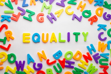 Group of colored letters forming the word "equality" in the center. Photo of the word equality. 