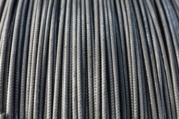Iron wire in roll. Warehouse of metal products. Close-up