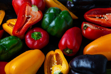 Overhead view of ripe red yellow green bell pepper food background