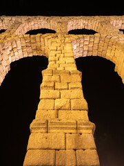 Night photo of the aqueduct of Segovia in a summer night, Spain.