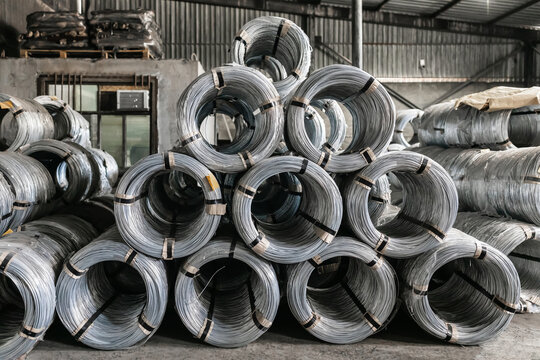 Pile of iron, metal wire rod or coil background for Construction