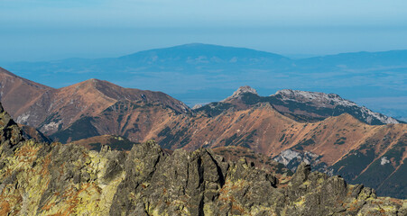 Part of Western Tatras with rocky Giewont hill and Babia hora hill on the background during...