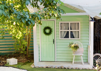 Small green shed garden house - Powered by Adobe