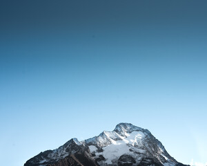 snow covered mountains with sky