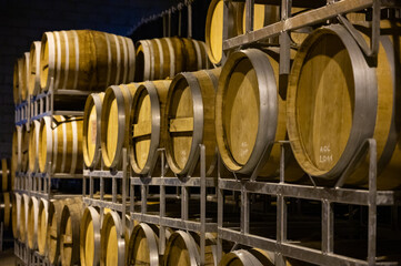 Production of sweet cassis creme liquor and strong marc from ripe black currant berries, distillation and maturation in wooden barrels. Burgundy, France