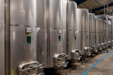 Production of sweet cassis creme liquor from ripe black currant berries, distillation and maceration in steel tanks,  Burgundy, France