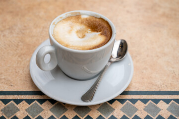 Fresh brewed coffee cappuccino in italian bar, morning coffee