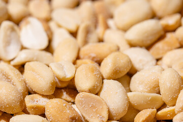 Dry Peanuts Salted Roasted without skin top view background or texture. Healthy spices, nuts, seeds and herbal products. Macro photo.