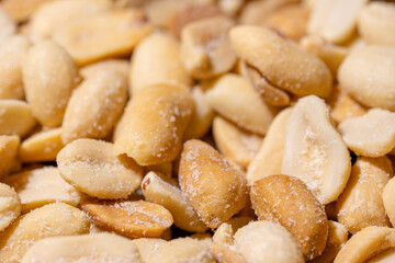 Dry Peanuts Salted Roasted without skin top view background or texture. Healthy spices, nuts, seeds and herbal products. Macro photo.
