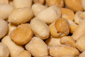 Dry Peanuts Salted Roasted without skin top view background or texture. Healthy spices, nuts, seeds and herbal products. Macro photo.