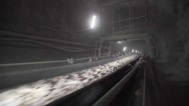 The equipment works in a mine deep underground. Extraction of useful minerals in the underground under the ground.