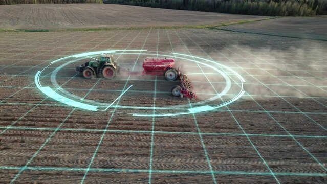 5G autonomous tractor without a driver working the soil before sowing. Future technology with smart agriculture farming concept. Analysis of data obtained from the field using artificial intelligence