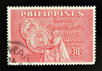Cancelled postage stamp printed by Philippines, that shows Manila Atheneum, celebrating 100th anniversary, circa 1959.