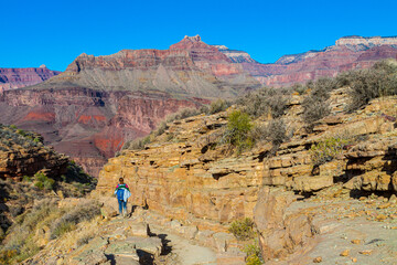 Female Hiker at The Tipoff With Solomon Temple in the Distance, South Kaibab Grand Canyon NP, Arizona, USA