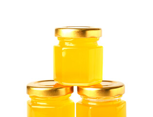 Jars with honey on white background, closeup