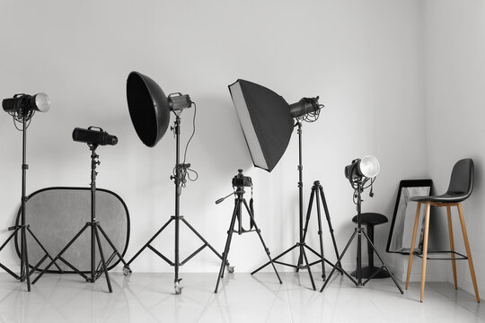 Modern lighting equipment in photo studio