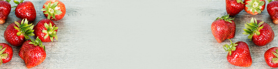 Red strawberry organic fruits on a table. Fresh berries fruit snack.