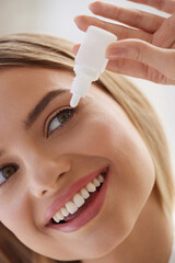 Woman With Eye Drops. Closeup Of Girl Applying Eye Drops In Eyes. Cheerful Blonde Woman Putting Eye...