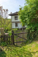 Typical street and old houses at village of Bozhentsi, Bulgaria